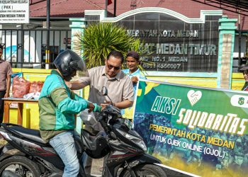 Melalui Kecamatan dan Kelurahan, Pemko Medan Bagikan Sarapan kepada Pengemudi Ojol